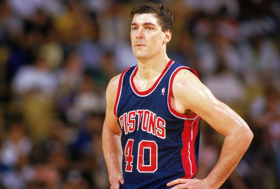 Bill Laimbeer looks on